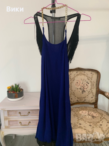 Рокля в размер 36, подходяща за S