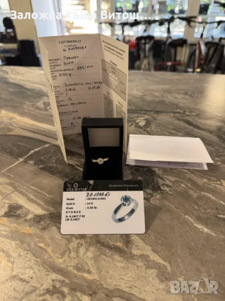 Златен дамски пръстен с диамант и син топаз 14к / 3.35 гр. / 0.19 ct., снимка 1