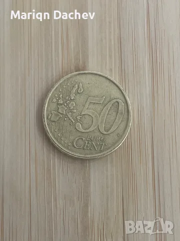 Монетата от 50 цента от 2001 г. от Испания е редовна евромонета с лика на писателя Мигел де Серванте