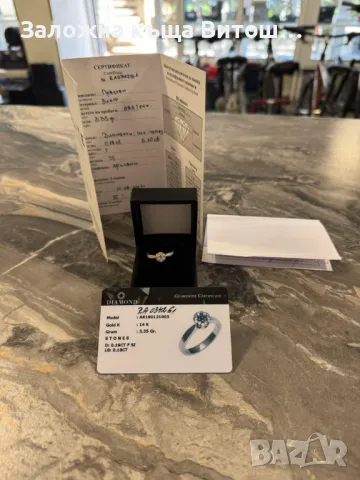 Златен дамски пръстен с диамант и син топаз 14к / 3.35 гр. / 0.19 ct.