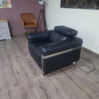 Черен кожен фотьойл Moreno с електрически релаксиращ механизъм, снимка 11 - Дивани и мека мебел - 44701881