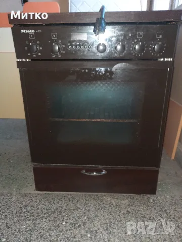 Готварска печка Миеле MIELE H 251 с керамични котлони вградена в Шкаф от МДФ