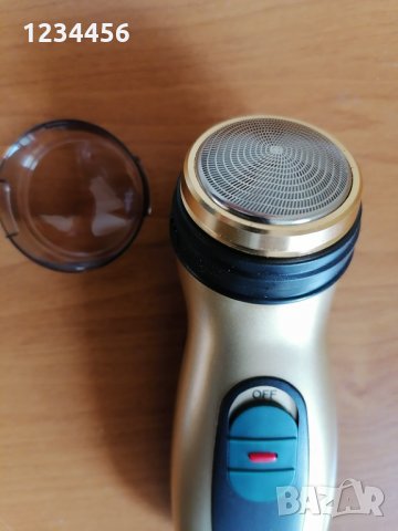 Нова, пакетирана самобръсначка на батерии, с тример, четка за почистване, упътване, запечатана, снимка 2 - Електрически самобръсначки - 35870790