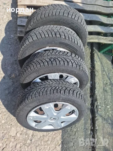 комлект гуми с джанти 14 4x100 4.5j,за тойота айго с оригиналните тасове