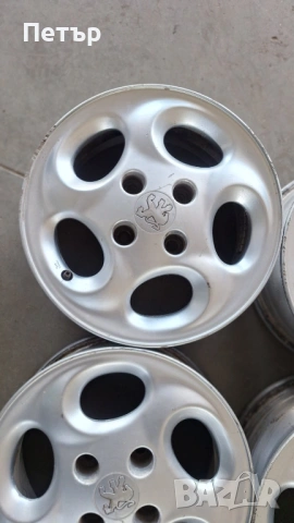 ОРИГИНАЛНИ АЛУМИНИЕВИ ДЖАНТИ ЗА ПЕЖО 4Х108Х65-14цола, снимка 2 - Гуми и джанти - 53833102