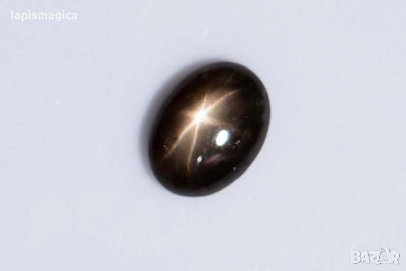 Черен звезден сапфир 0.94ct 6-лъчева звезда овален кабошон, снимка 1