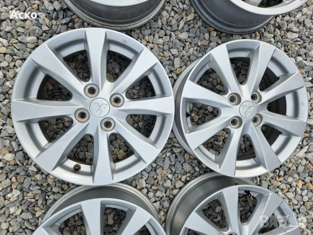 4x100..15.цола..5j ET46 оргинални Mitsubishi, снимка 2 - Гуми и джанти - 50618960