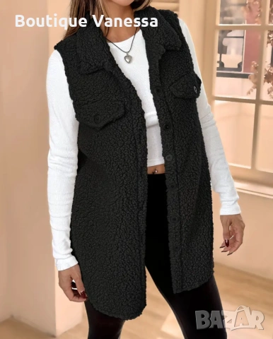 Дамски пухкав елек в черно 