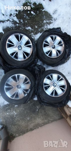 Джанти рено клио 15 със зимни гуми и тасове, снимка 1