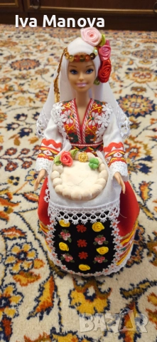 Кукла барби в носия