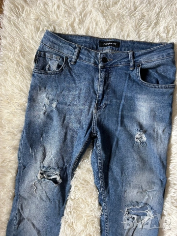 Дамски дънки с накъсан ефект