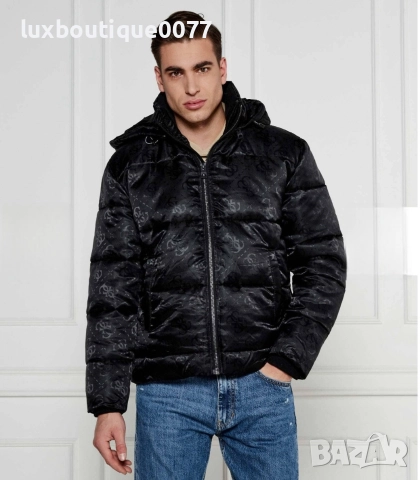 Използвано в много добро състояние зимно пухено яке Guess L