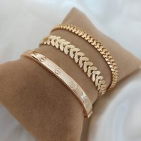 Set of 3 gold colored bracelets..., снимка 1 - Гривни - 41166492