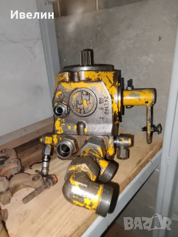 Хидравлична помпа реверсивна
