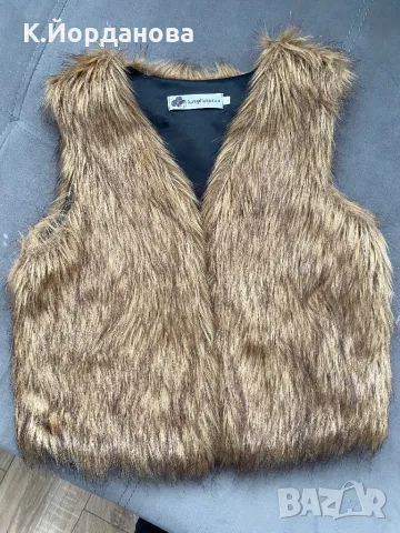 Дамски пухен елек