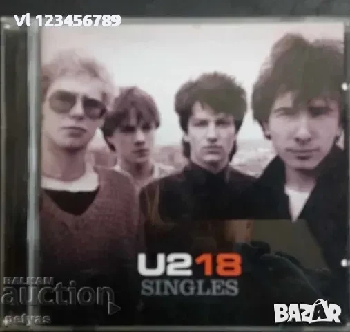 СД -U2 18 SINGLES