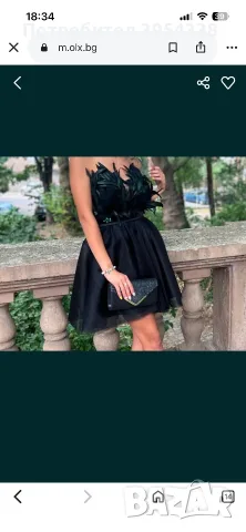 Елегантна рокля с естествени пера 
