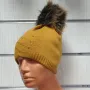 Нова зимна дамска шапка с камъчета отпред и с пух/помпон в цвят горчица, снимка 2