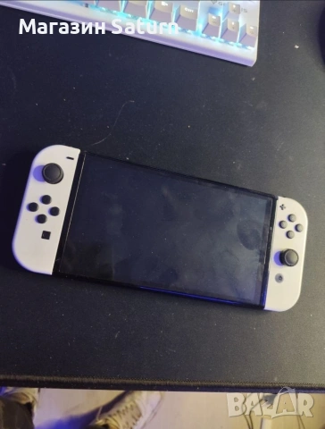 Nintendo switch oled с две игри и една година гаранция, снимка 4 - Nintendo конзоли - 53348478