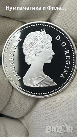 Сребърна монета Канада 1 долар 1986 година, снимка 2 - Нумизматика и бонистика - 52707125