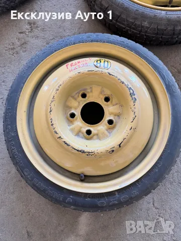 Резервна гума “тип патерица”Mazda 