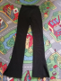 Черен панталон с цепки хс, снимка 1 - Панталони - 44689955