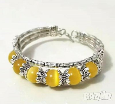 Красива гривна от Тибетско сребро с жълти опали