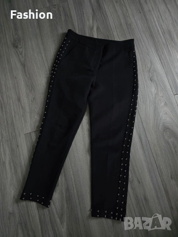 Жесток чер дамски панталон с капси