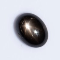 Черен звезден сапфир 1.35ct 6-лъчева звезда овален кабошон, снимка 1 - Други - 41635735