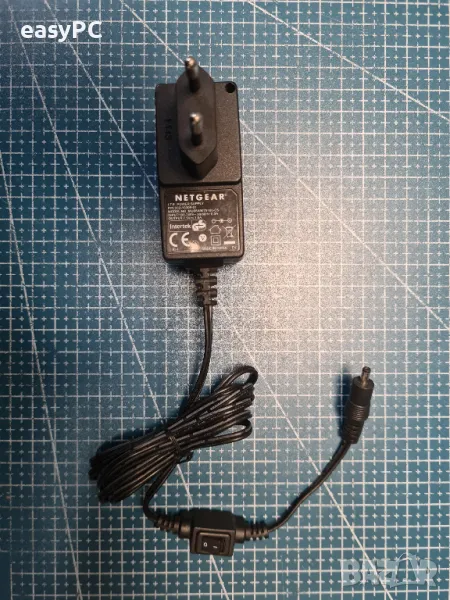 Оригинален захранващ адаптер Netgear 332-10309-01 MU08A9075100-C5 7,5V 1A, снимка 1