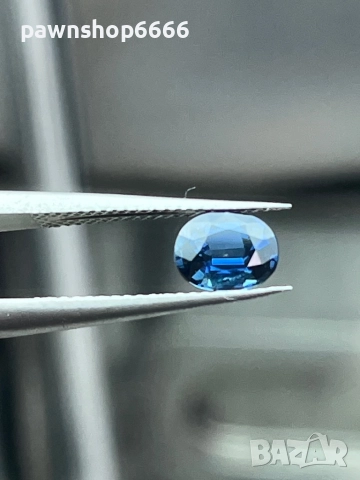 Естествен синьо-зелен сапфир – 0.85 ct  Овал  Отличен търговски клас
