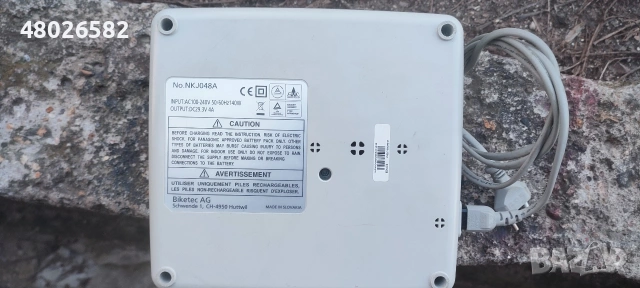 Зарядно за батерии Panasonic 24v, снимка 2 - Велосипеди - 53636517