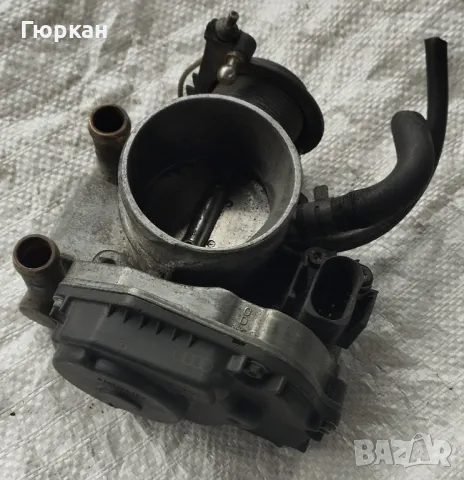 Оригинал Дроселова Клапа за Audi A4 -A6  VW  Passat  058 133 063 H