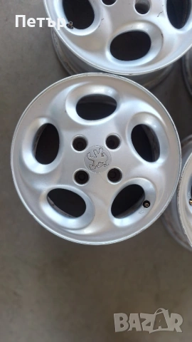 ОРИГИНАЛНИ АЛУМИНИЕВИ ДЖАНТИ ЗА ПЕЖО 4Х108Х65-14цола, снимка 4 - Гуми и джанти - 53833102