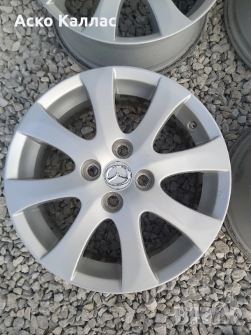 4х100. 15.цола.6j.ET45 оргинални Mazda, снимка 4 - Гуми и джанти - 51829747