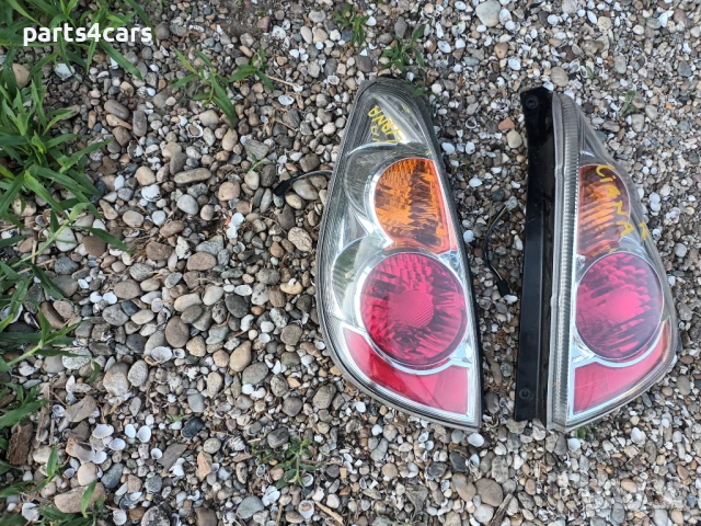 ляв и десен бял стоп за сузуки лиана SUZUKI LIANA, снимка 2 - Части - 50982367