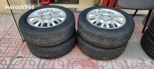 Летни гуми Uniroyal The Rain tyre 195/60R15H с джанти Mitsubishi, снимка 1 - Гуми и джанти - 41332572