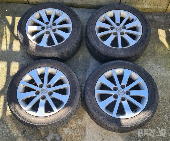 Оригинални лети джанти за Mazda 16 цола 5х114.3 с летни гуми Continental