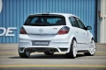 Rieger тунинг добавка за задна броня за Opel Astra H , снимка 1