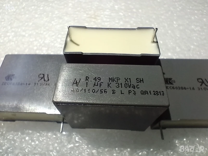 1uF/310Vac/700Vdc клас X1, MKP кондензатори, +/-10% толеранс на капацитета, растер 27.5мм, снимка 1