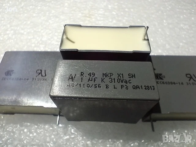1uF/310Vac/700Vdc клас X1, MKP кондензатори, +/-10% толеранс на капацитета, растер 27.5мм