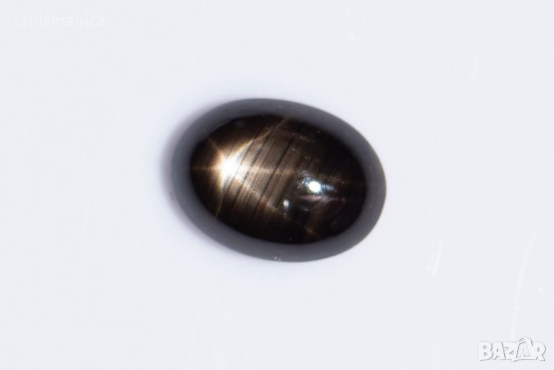 Черен звезден сапфир 1.51ct 6-лъчева звезда овален кабошон, снимка 1
