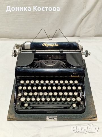 Пишеща машина Olympia , снимка 2 - Антикварни и старинни предмети - 44919854
