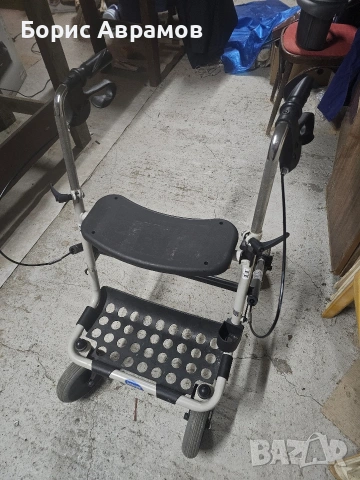 проходилка на колела със спирачки и стол !