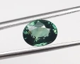 Естествен сапфир в искрящ зелен цвят 0.94кт.! Сертифициран! нов!, снимка 2