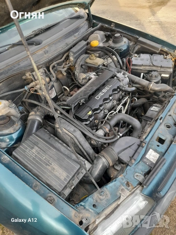 Opel Astra 1.7 TD, снимка 11 - Автомобили и джипове - 53048939