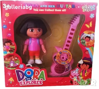 Фигурка на Дора изследователката с китара (Dora the Explorer), снимка 1 - Фигурки - 39007106
