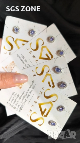 Сребърни обеци с естествен танзанит.