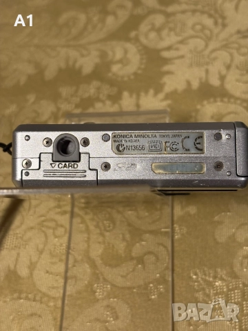 KONICA MINOLTA DIMAGE X50, снимка 9 - Фотоапарати - 52466694