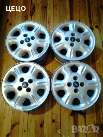 Алуминиеви джанти 14 " . С 4 бр зимни гуми . ИЗГОДНО !, снимка 2 - Гуми и джанти - 52556148